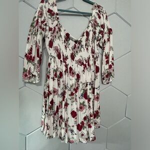 White with flowers off shoulder shirt